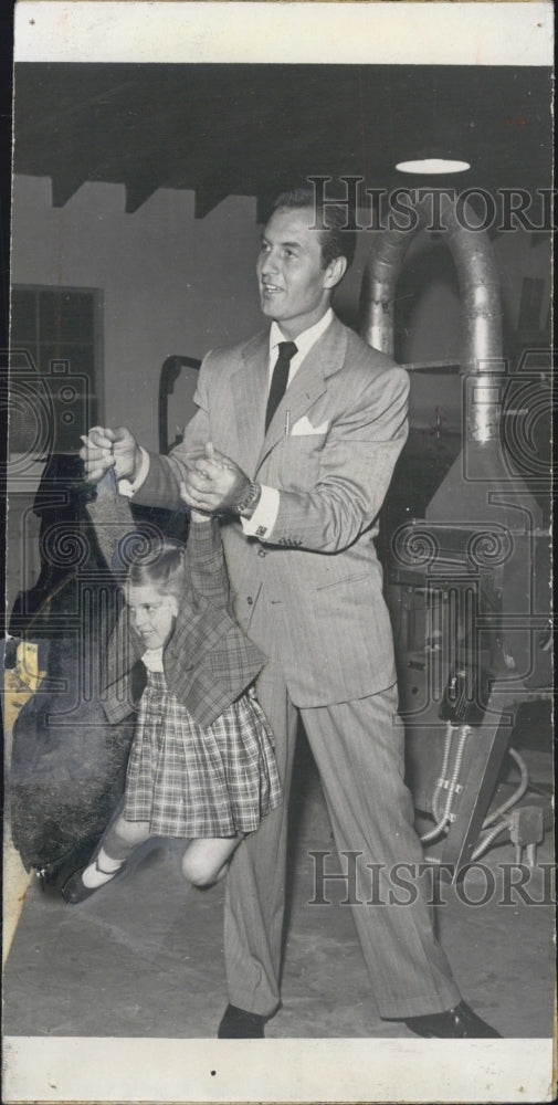 1952 Press Photo George Montgomery Plays With His Daughter Melissa IKn His Shop - Historic Images