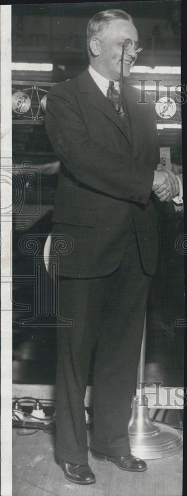 1928 J. Andrew White in suit shaking hand of unknown person - Historic Images