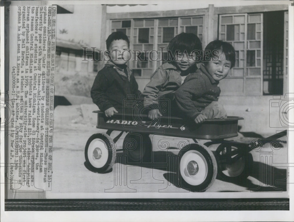 1964 Central Michigan University adopted these Korean children. - Historic Images