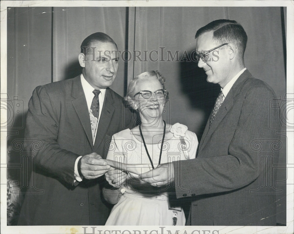 1958 Eagles present check to Muscular Dystrophy Association - Historic Images