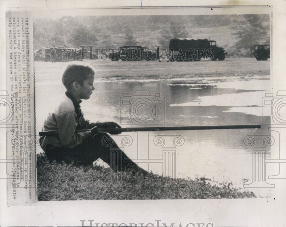 1964 Press Photo Ricky Hall fishing after National Guard was called in on strike - Historic Images