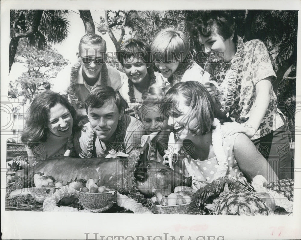 1967 FL Presbyterian College student have a Luau. - Historic Images