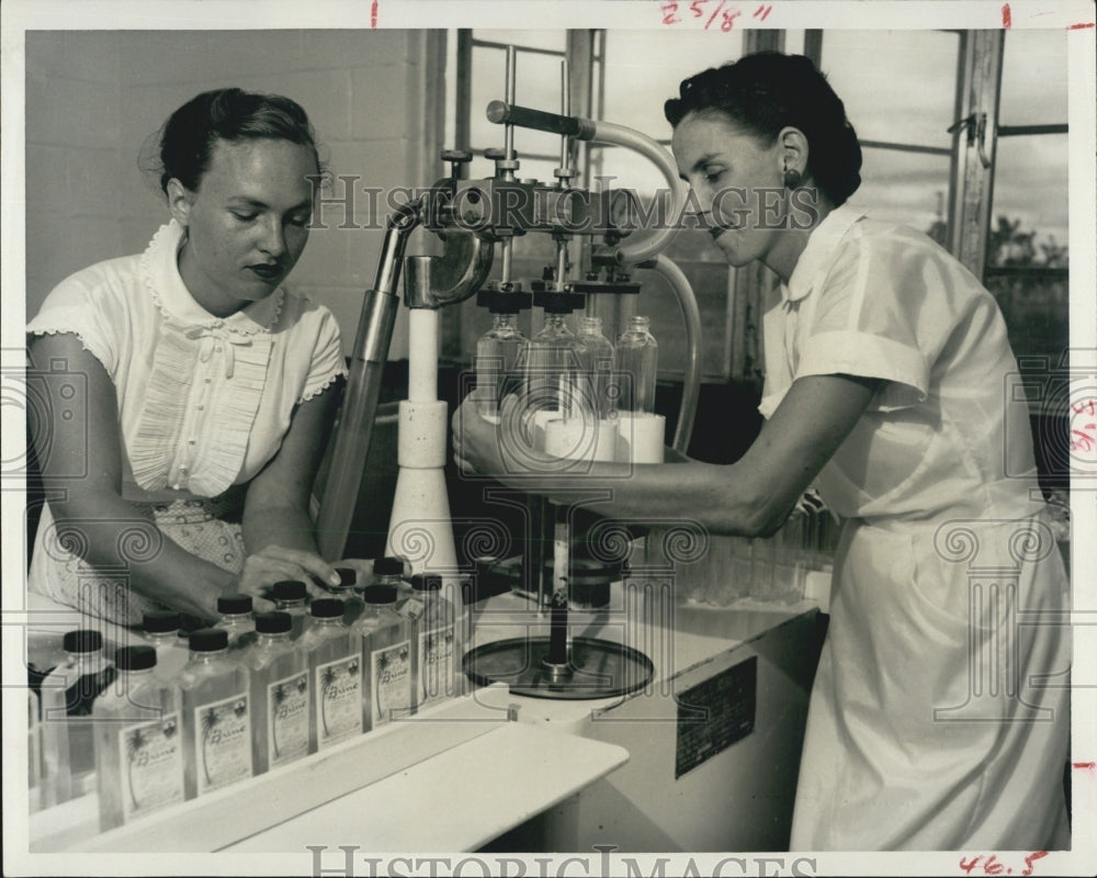 1960 Ernestine Rick Lucille McCoy machine bottling sea Brine - Historic Images