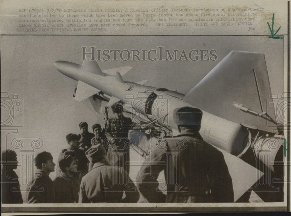 1970 A Russian officer lectures servicemen on ground-to-air missiles - Historic Images