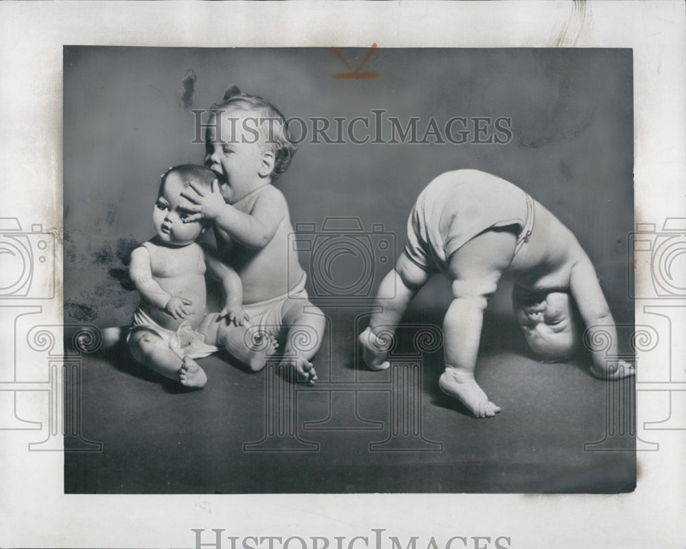 1958 Playing Babies with Doll-Historic Images