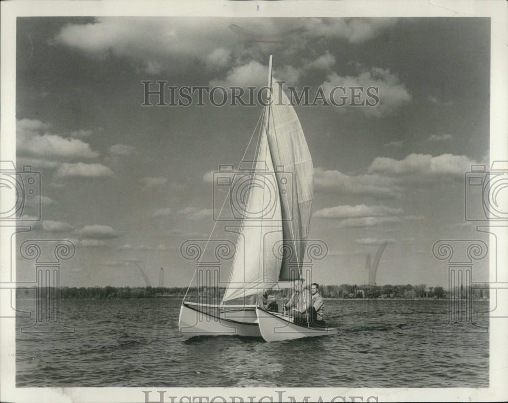 Press Photo Two Unidentified Men Sailboating - Historic Images