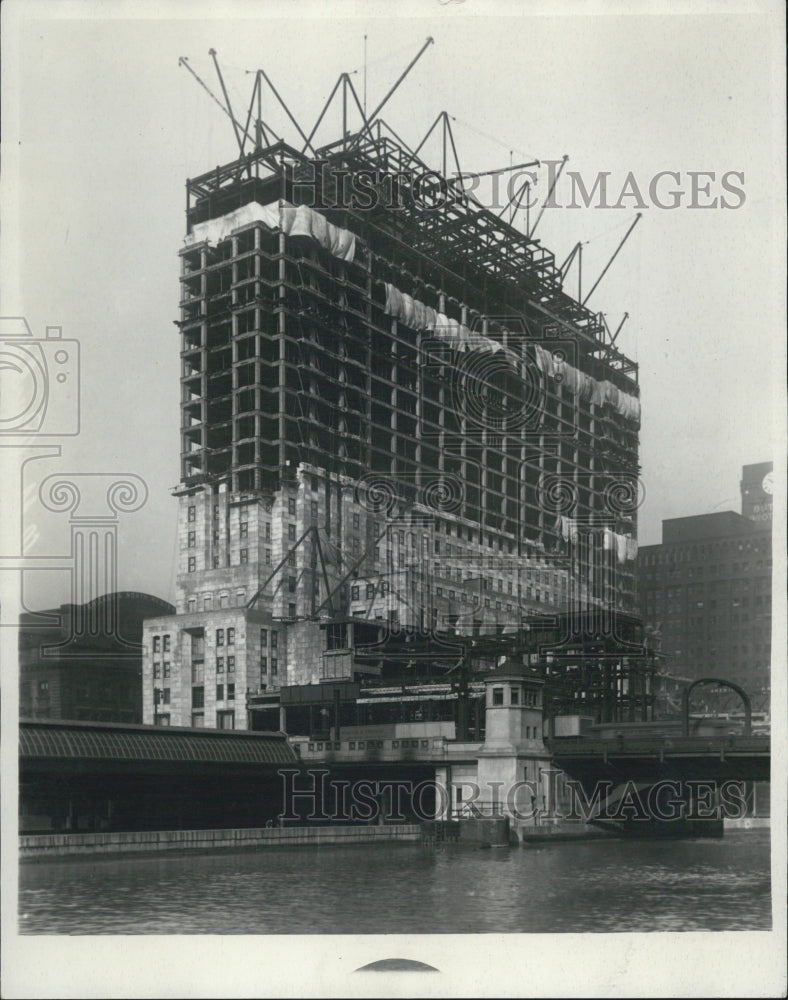 Press Photo several story building on body water - Historic Images