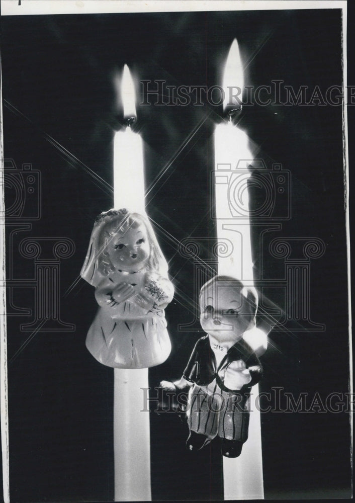 1976 Press Photo Candle climber figurines. - Historic Images