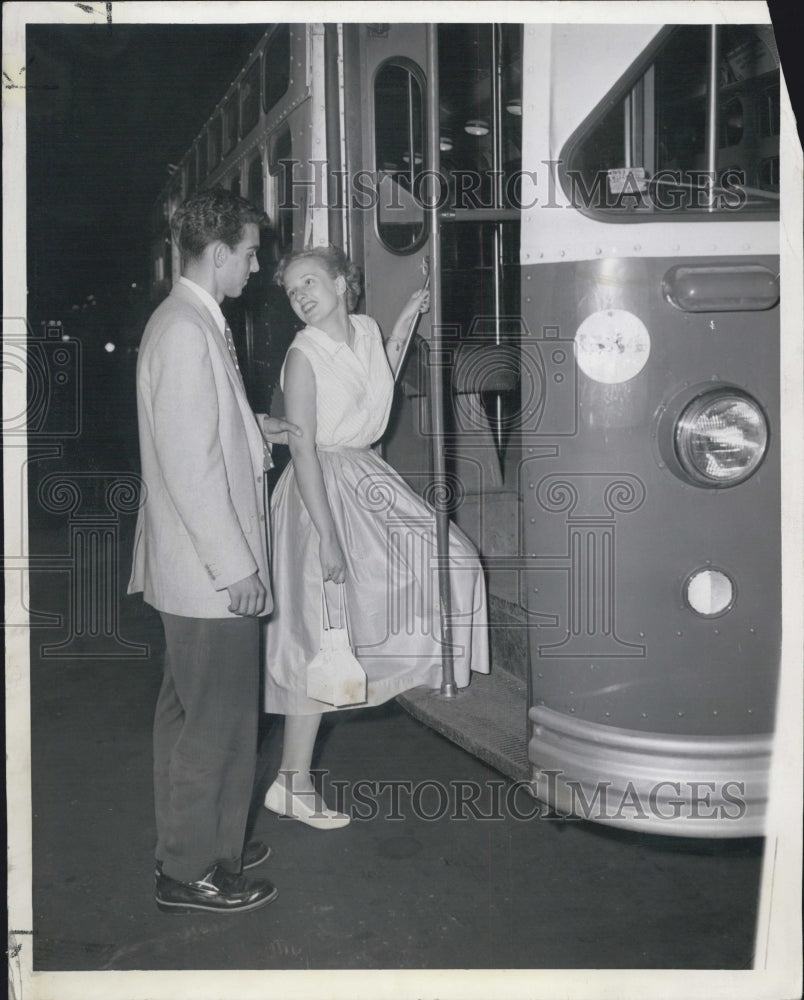 1953 Date night Peter and Sandra rides a bus to save time and money. - Historic Images