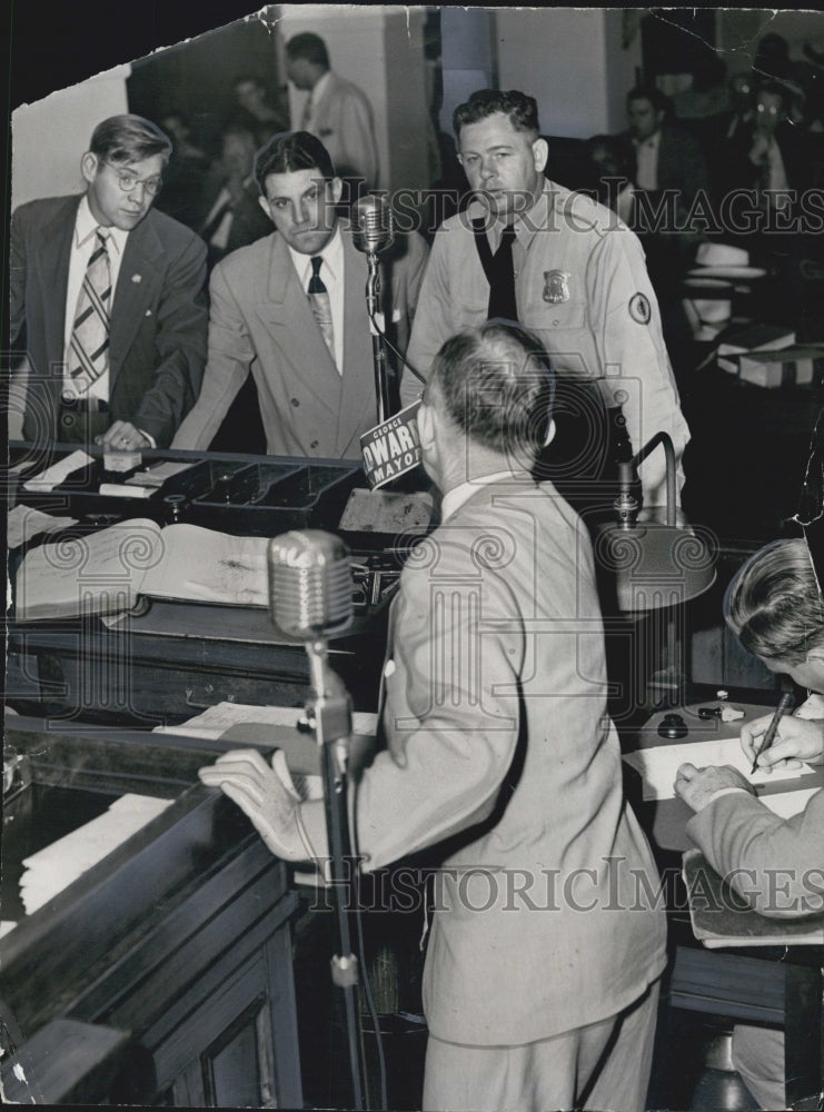 1949 Art Barney handling the George Edward sticker,mayoral candicate - Historic Images