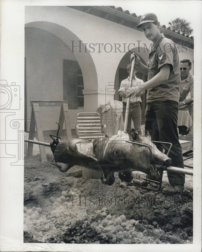 1974 Press Photo U.S. Coast Guard roasting pig - RSG56515 - Historic Images