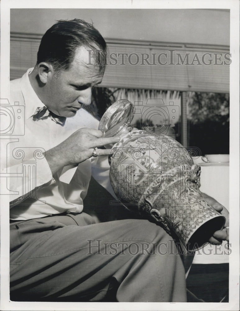 1958 Robert Eldred Examines Antique Kang-Shi Vase at Bigelow Estate - Historic Images