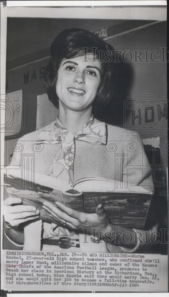 1964 Norma Knobel Preparing for her class with History Book - Historic Images