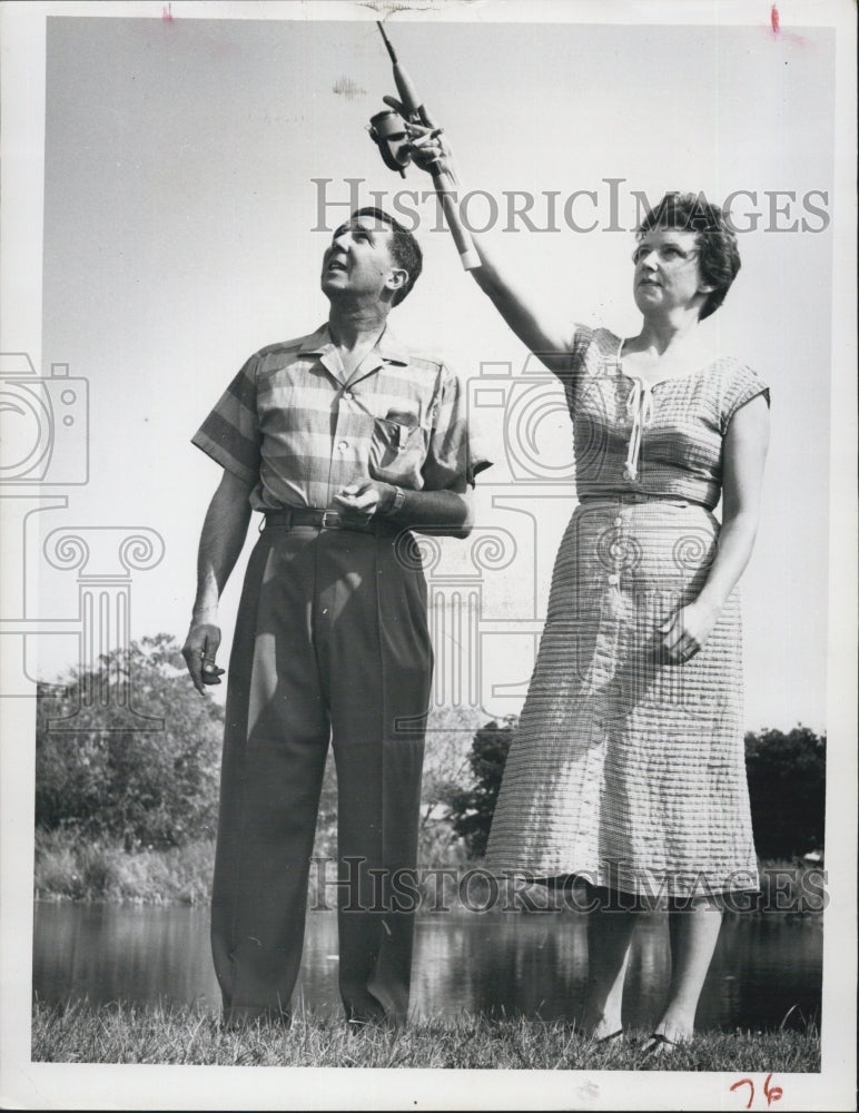 1957 Ray Stephens instructing Mrs James Tobias learn spin distance - Historic Images