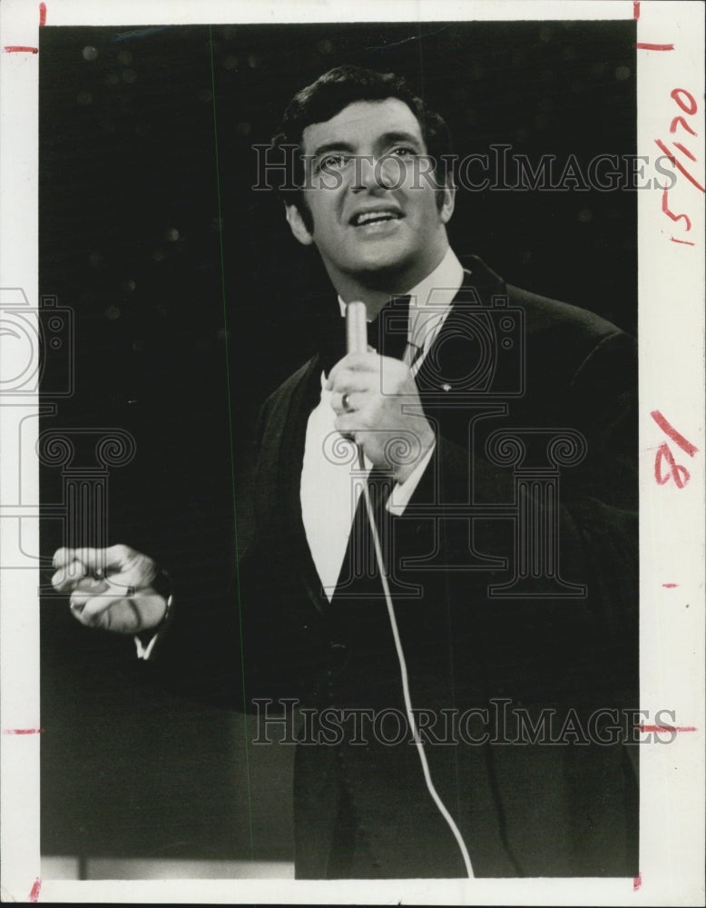 1968 Entertainer Frankie Vaughan Holding Microphone - Historic Images