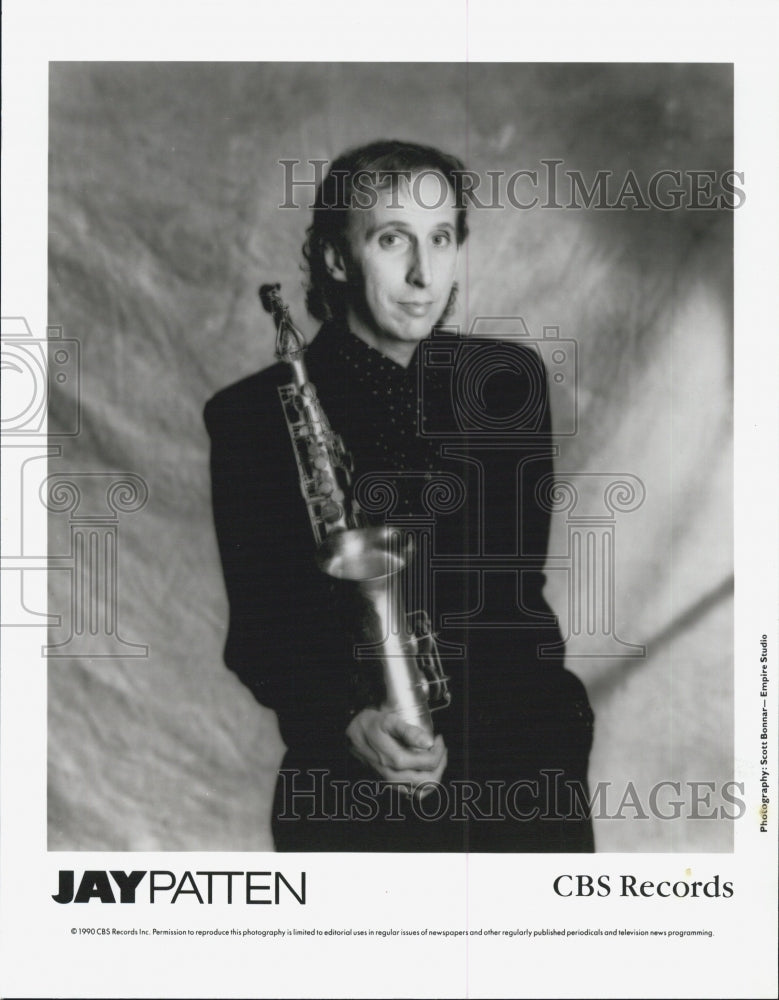 1991 Press Photo Jay Patten holding a saxophone - Historic Images