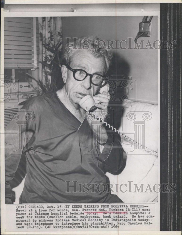 1964 Sen.Everett Dirksen uses phone from hospital bedside - Historic Images