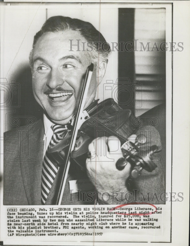 1957 George Liberace,plays the violin. - Historic Images