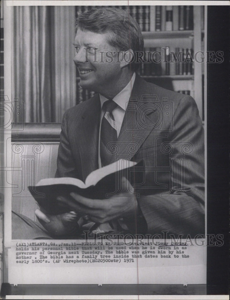 1971 Georgia Governor Elect Jimmy Carter Holds His Personal Bible - Historic Images