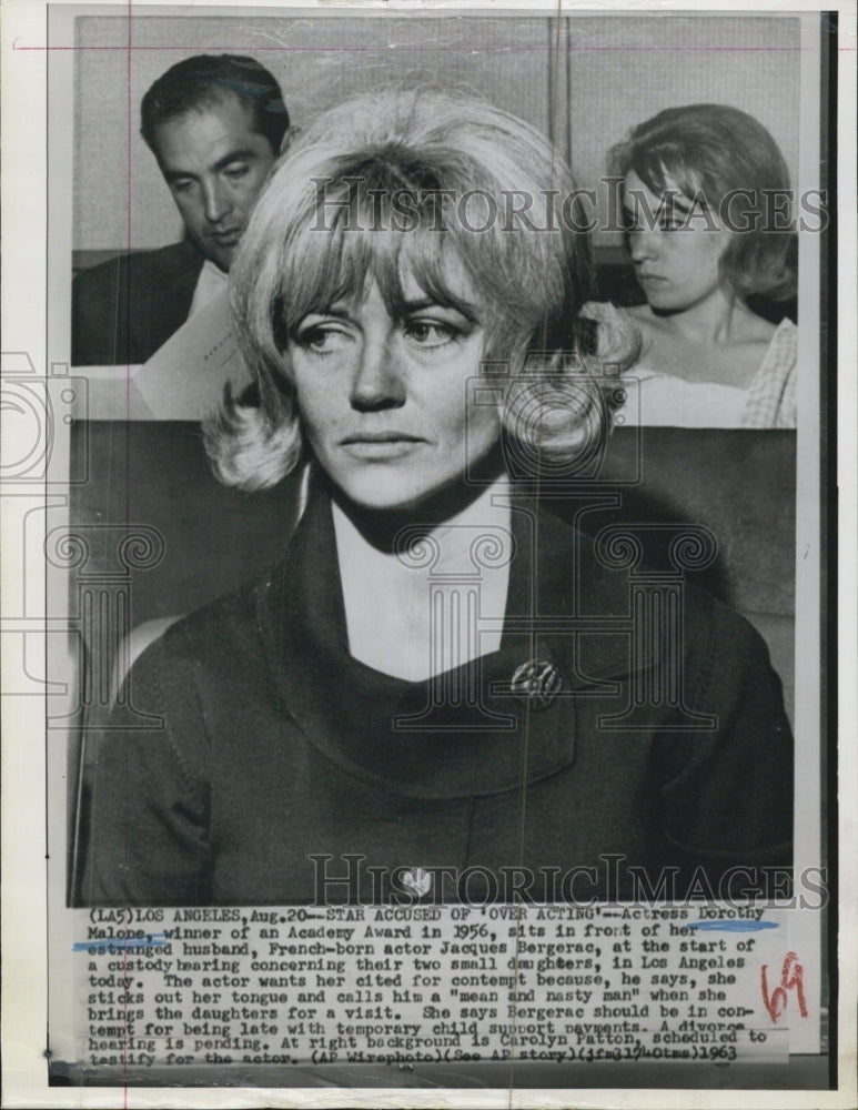 1963 Dorothy Malone in court for custody hearing. - Historic Images