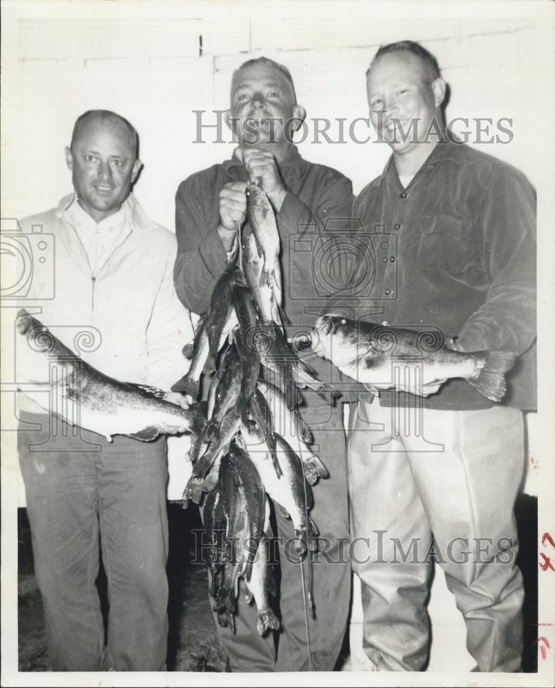 1962 of men with bass caught out of Camp Okee-Simmee, Florida - Historic Images