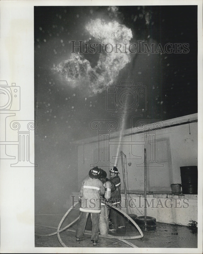 1976 Firemen residents respond to fire on USF Bayboro Campus - Historic Images