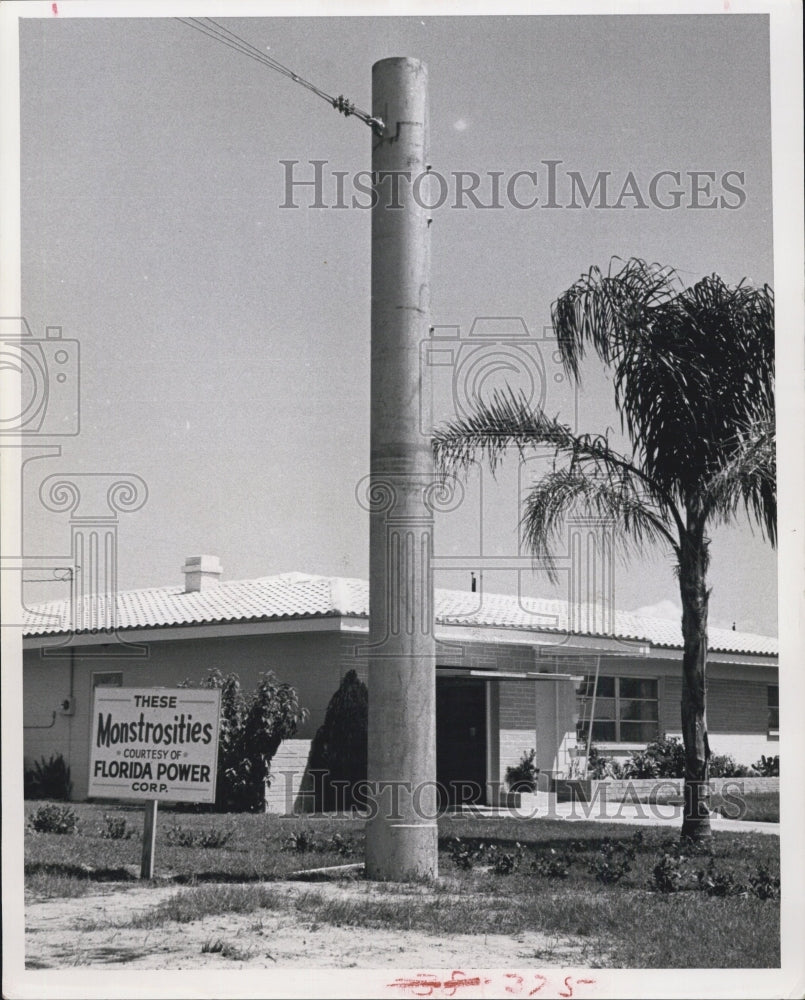 1963. of an unsightly utility pole installed by Florida Power Corp. - Historic Images