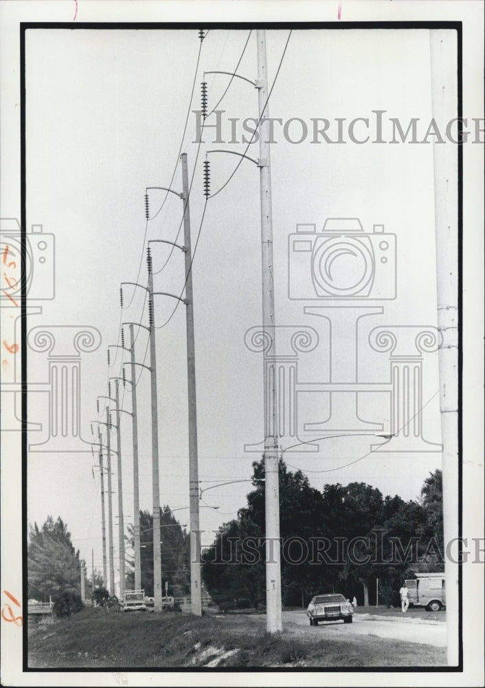 1975 metal power poles along 16th st. N. - Historic Images