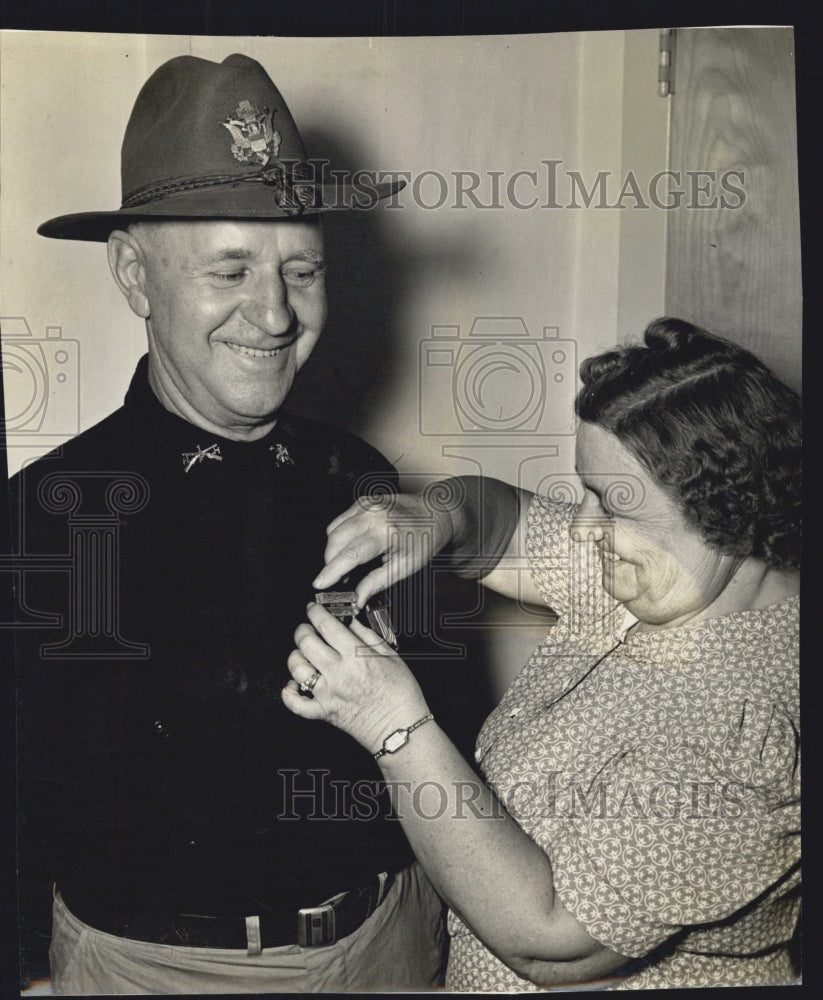 1941 Mrs. Wood Pins Medals On Husband, Edwin Wood - Historic Images