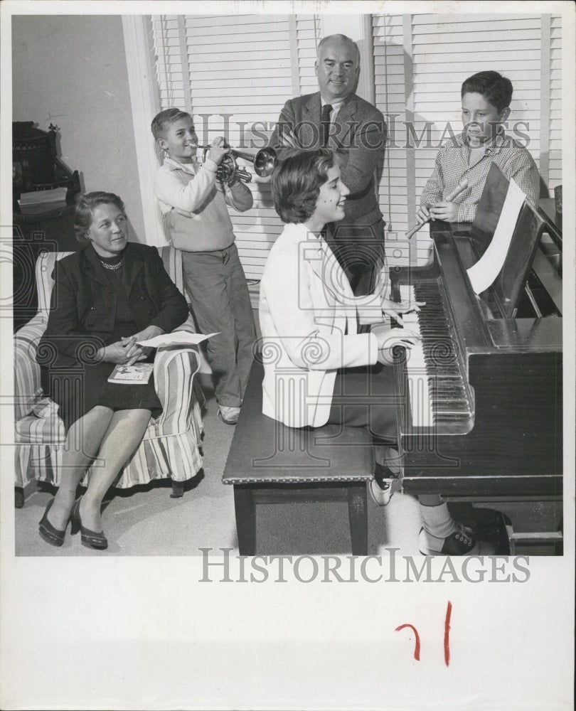 1956 Robert Wilson and Family playing Piano. - Historic Images