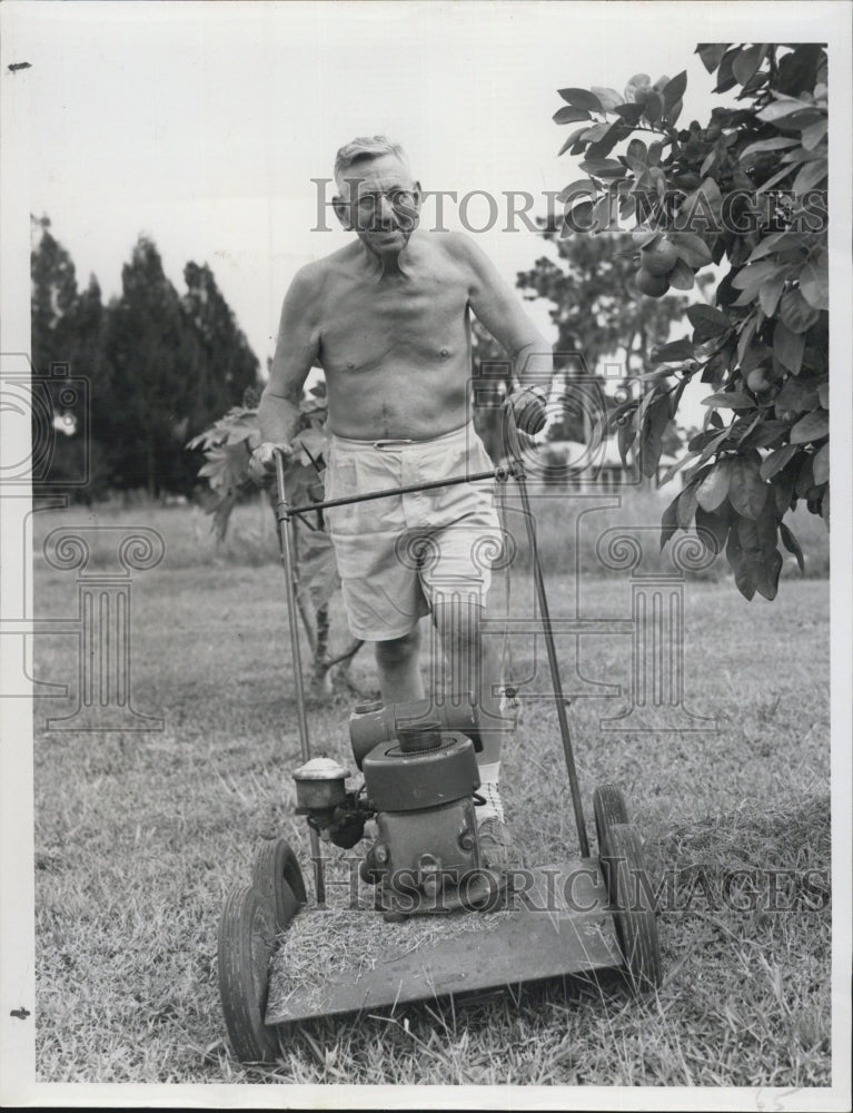 1953 Press Photo Mr Wilson Mowing Lawn - Historic Images