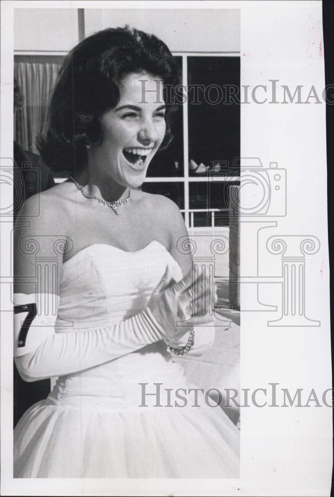 1962 Press Photo Theresa Mailhot a girl in the photo wearing the white gown. - Historic Images