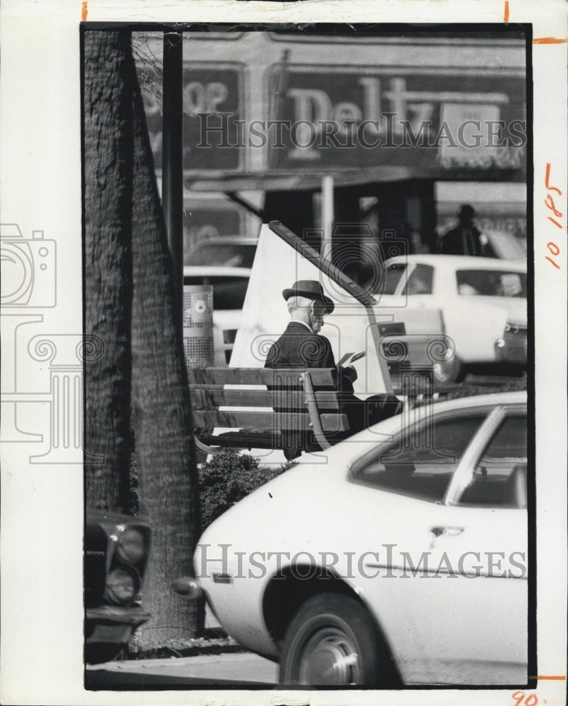 1973  A MAN STANDING BY A CAR. - Historic Images