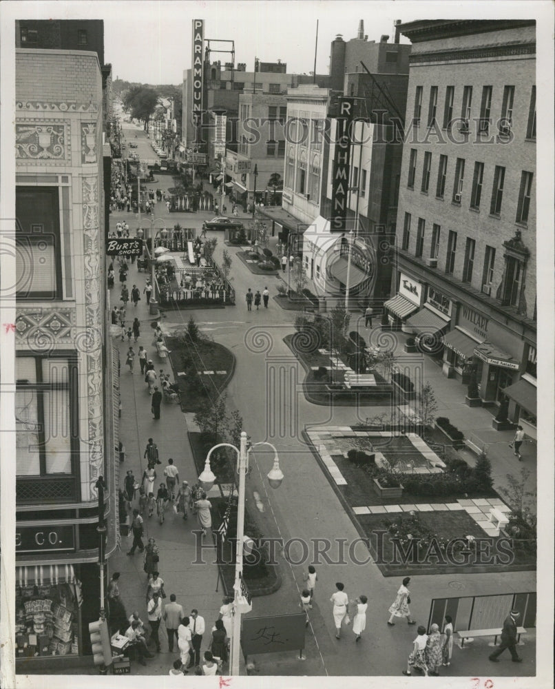 1963 Streets with people walking. - Historic Images