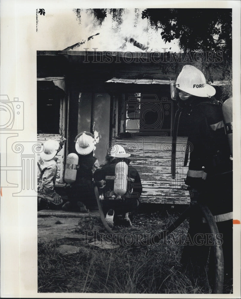 1976 New Port Richey Fireman practice House Burning - Historic Images