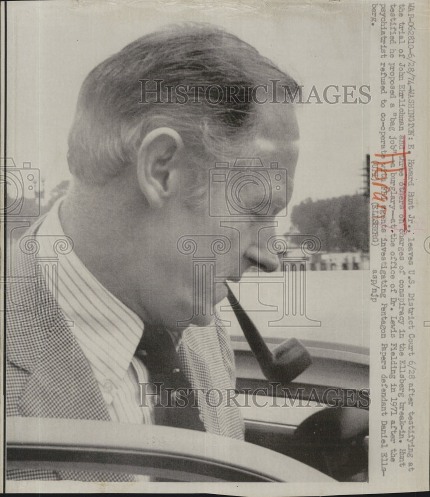 1974 E. Howard Hunt Jr. leaving U.S. District court - Historic Images