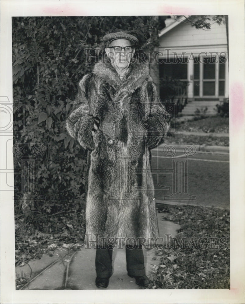 1962 Dick Hovey Wears Old Raccoon Fur Coat To Fight Cold Weather - Historic Images