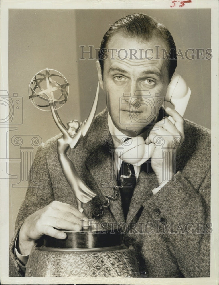 1964 Bob Newhart Hosts The Emmy Awards Program-Holds Emmy - Historic Images