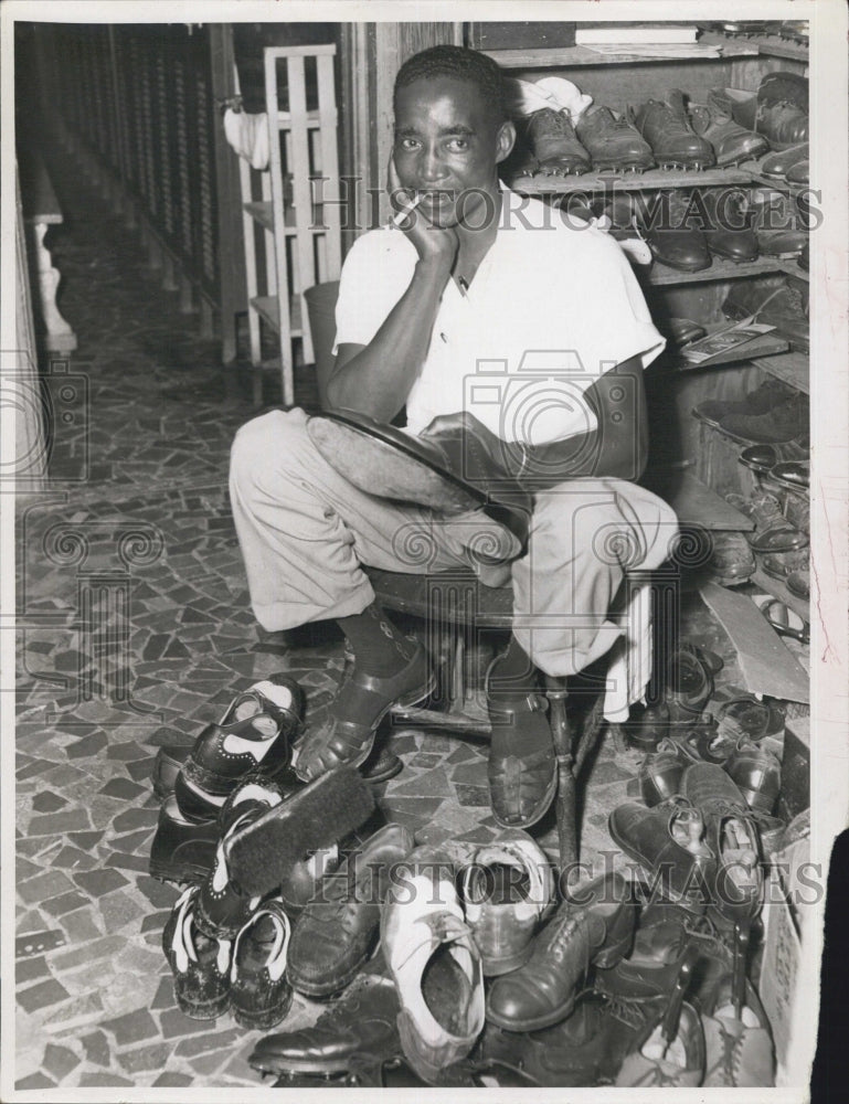 1954 Lakewood Clubhouse Attendant Required to Shine Many Shoes - Historic Images
