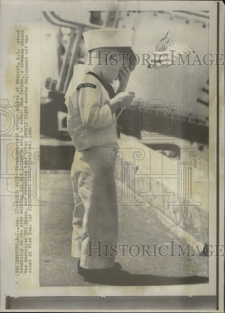 1966 of Arthur Bisbee waiting tearfully for dad&#39;s ship, USS Dyess - Historic Images