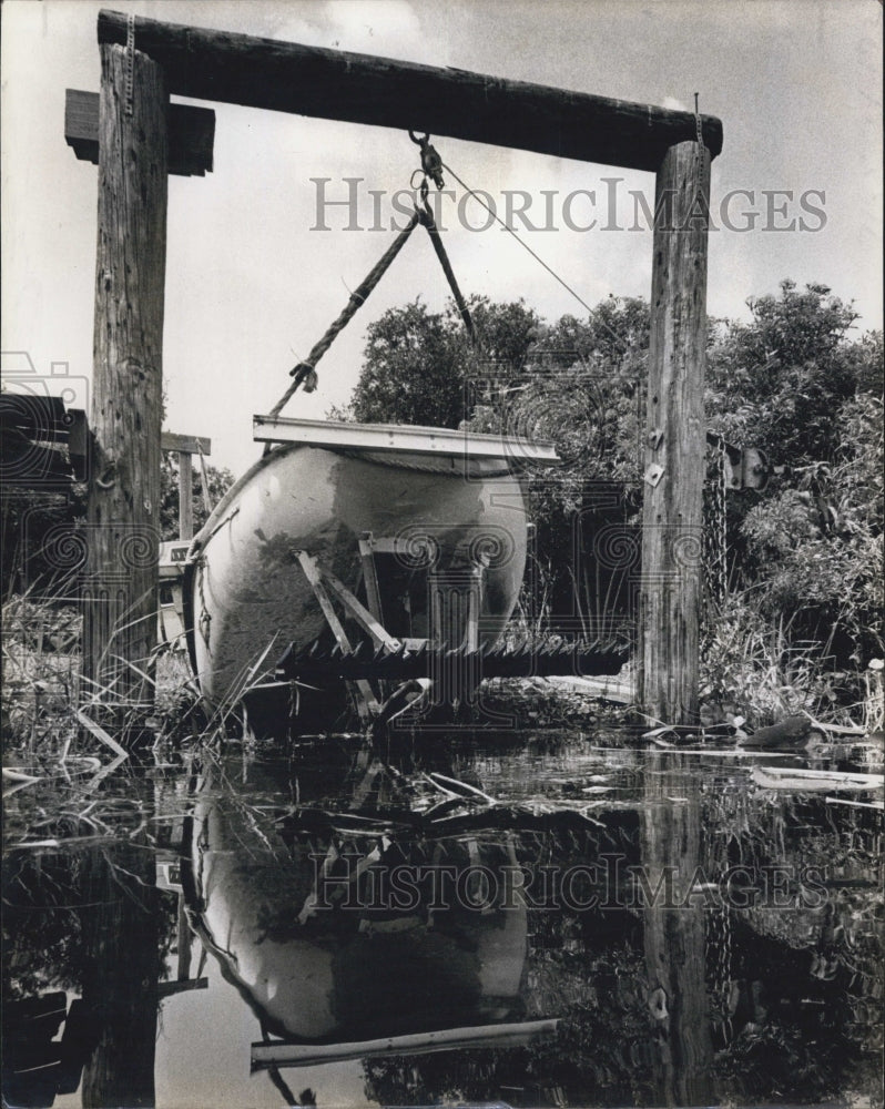 1978 Pictured is Mike O'Brien's water weed cutter. - Historic Images