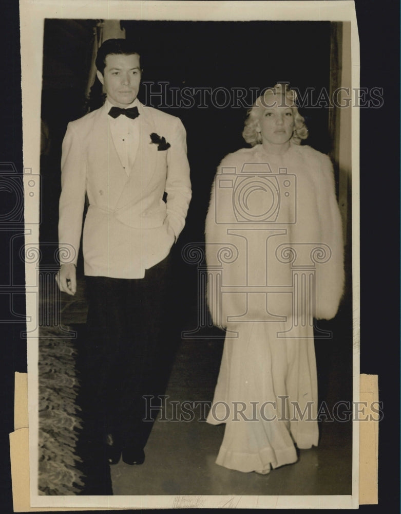1939 Anne Cooper Hewitt Heirness, escorted by Brad Steet. - Historic Images