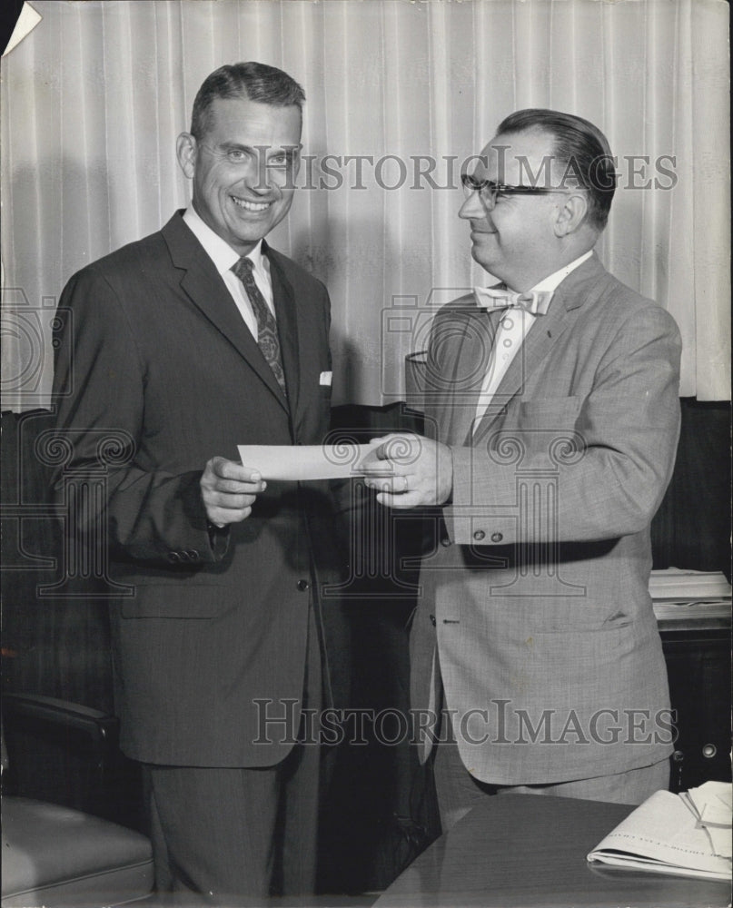 1967 Dr.George Baughman received a check to Donald Monnier. - Historic Images