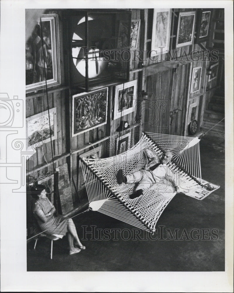 1961 Press Photo Guy Paschal laying back on a hammock - RSG76625 - Historic Images