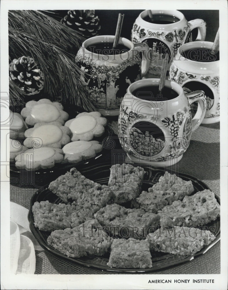 1976 Pictured are honey oatmeal chews and cookies with icing crusts. - Historic Images