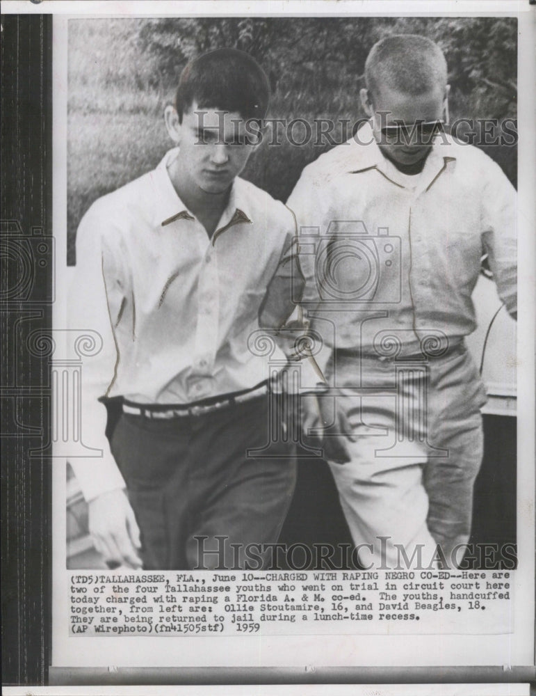 1959 The youths handcuffed together. Ollei Stoutmire(left) and David Beagles - Historic Images