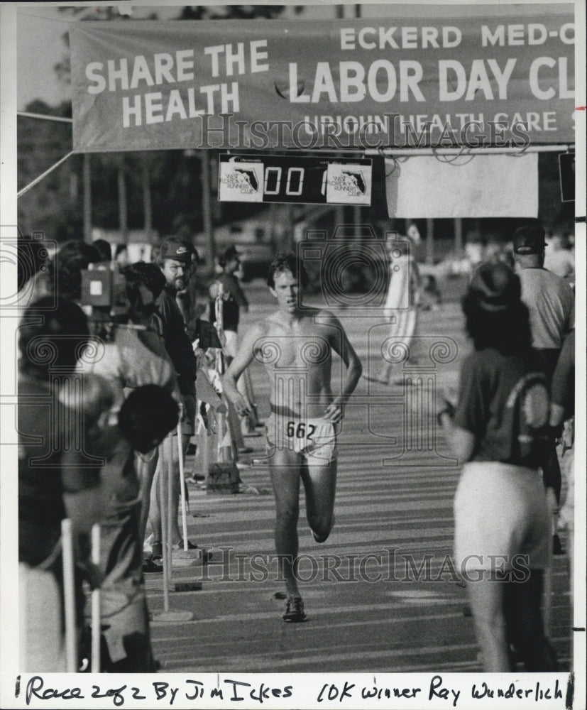 1983 Press Photo Ray Wunderlich crosses the finish line - Historic Images