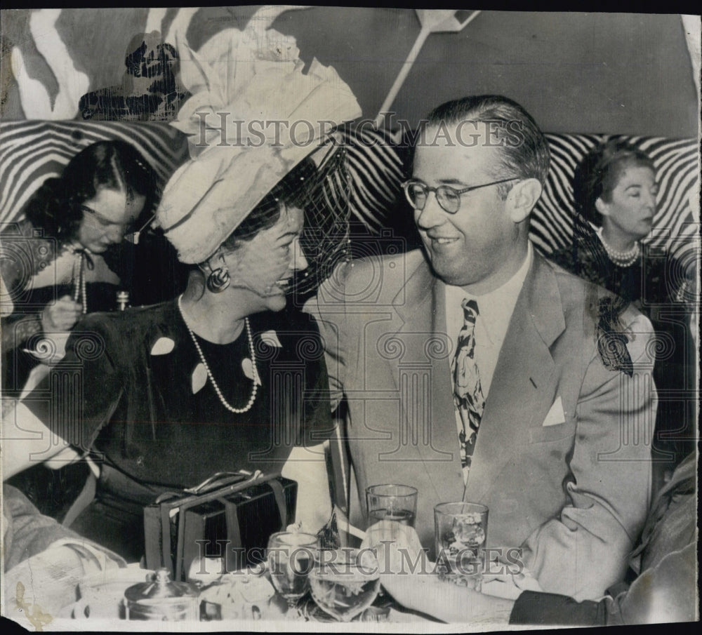 1948 Arline Judge with insurance man George Ross Jr. in night club - Historic Images