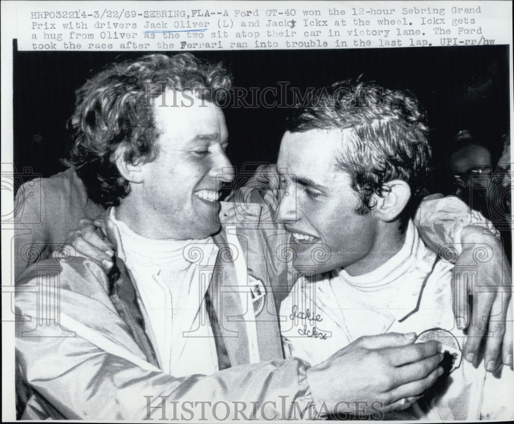 1969 Jack Oliver and Jack Ickx, after winning a car race together - Historic Images