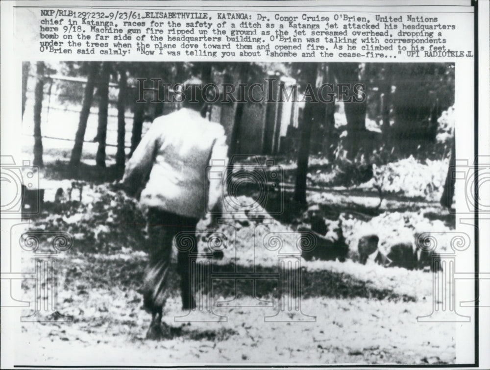 1961 Dr Conor Cruise O'Brien running from attack on his headquarters - Historic Images